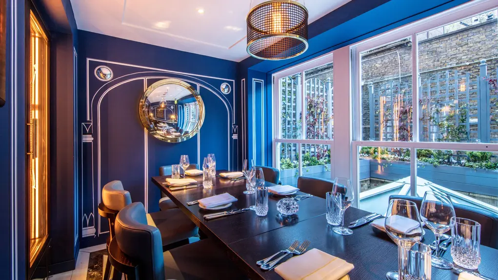 Private dining table set for dinner