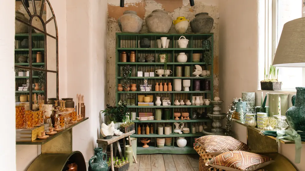 The inside of Wild at Heart florist showing shelves packed with gifts