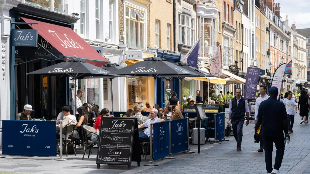 People dining outside on South Molton Street