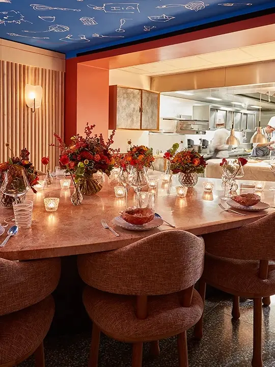 Inside Michelin star restaurant with open plan kitchen