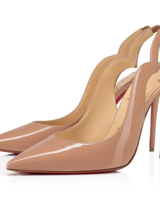 High-heeled peach-coloured slingback shoes
