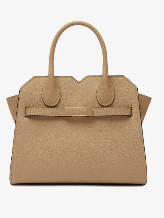 A beige Valextra handbag