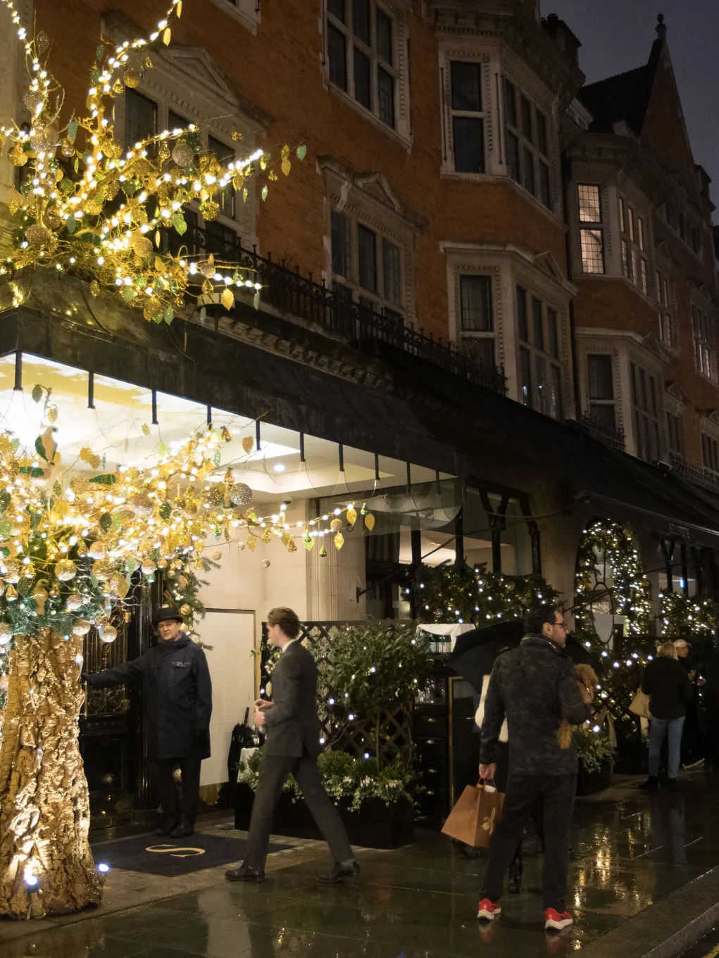 The outside of Scott's restaurant decorated with Christmas lights