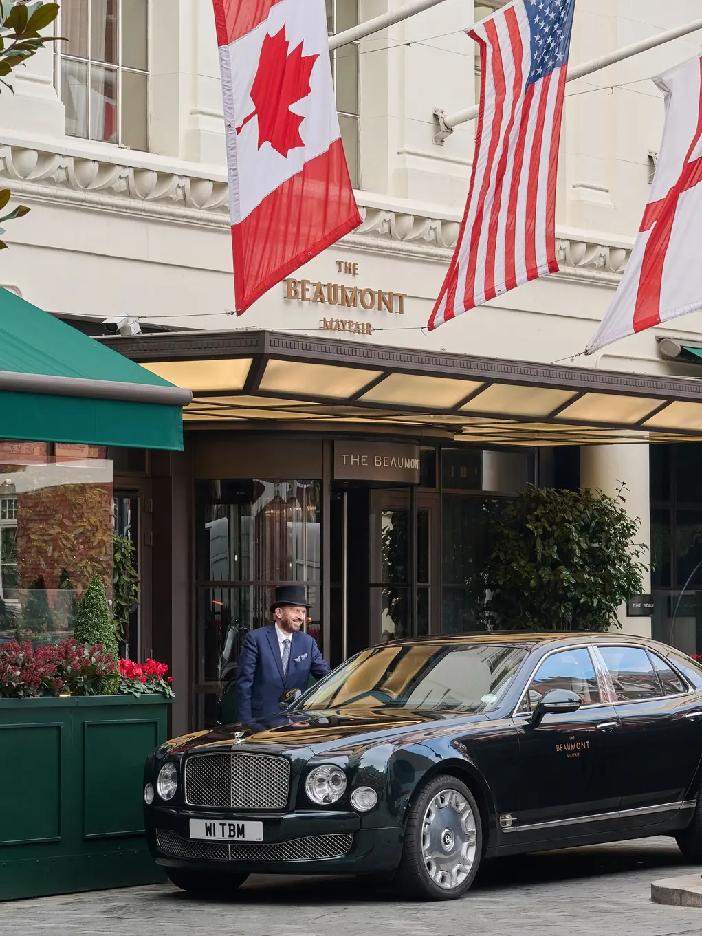 The exterior of The Beaumont with its doorman