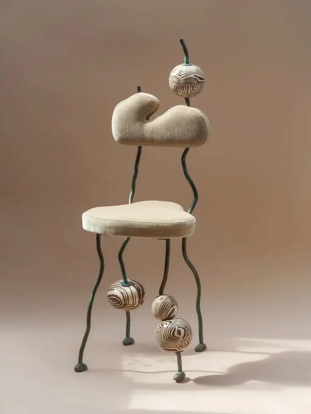 A chair with spindly legs 