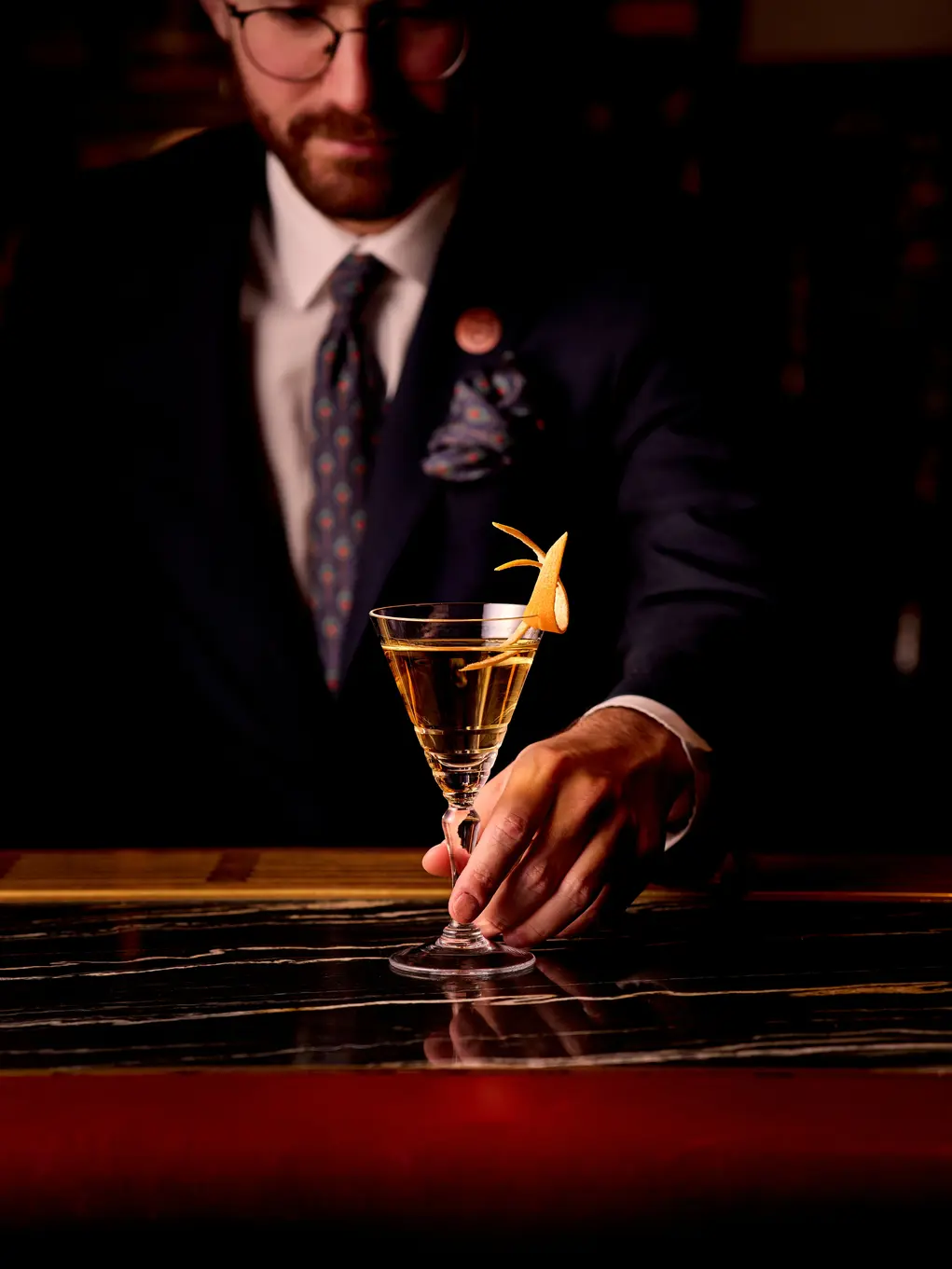 Barman presents cocktail 