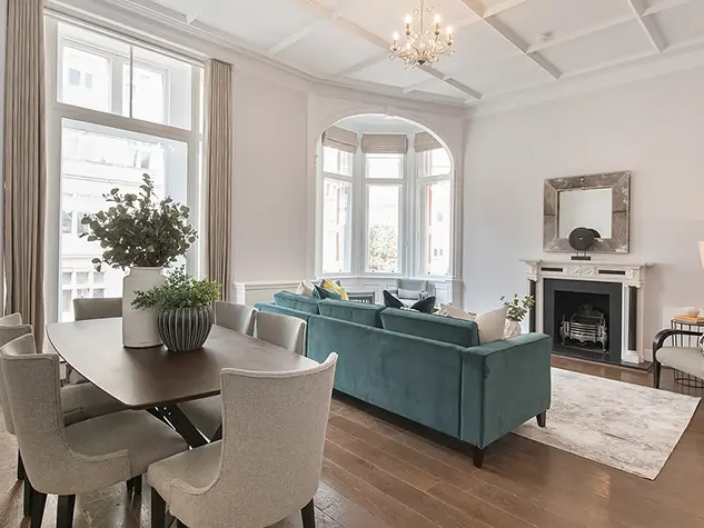 Living room with a sofa and dining table