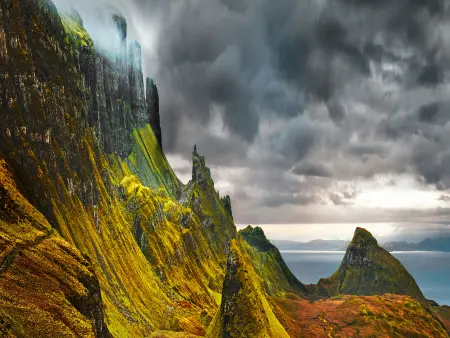 A landscape of mountains covered in moss 