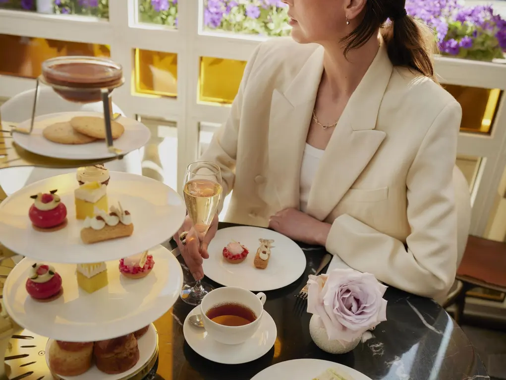 A woman enjoying an afternoon tea