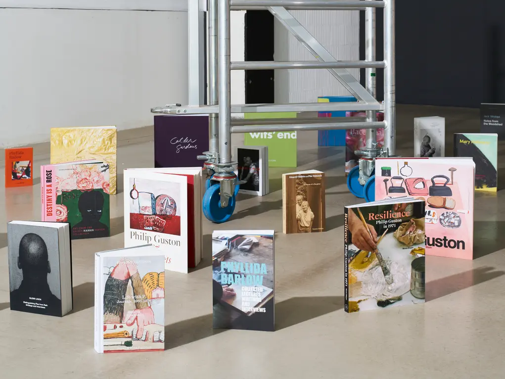 Books standing up on the floor 